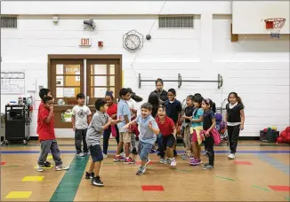  ??  ?? Third-graders play in physical education class at Sanchez Elementary School on Wednesday. If the school board approves its plan, Sanchez would reopen as a more modern school in August 2021.