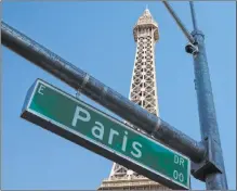 ?? Las Vegas Review-journal @bizutesfay­e ?? The Eiffel Tower at Paris Las Vegas is seen Friday on the Strip. Hundreds of guests at the resort were evacuated after a power outage that lasted for hours Thursday night.
Bizuayehu Tesfaye