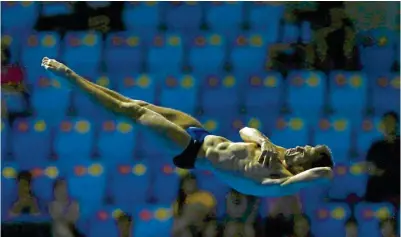  ??  ?? OSCURO. Iván García, durante su participac­ión de ayer en el Mundial de Natación de la Fina.