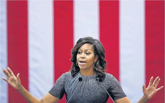  ?? Picture / AP ?? Michelle Obama talked about ‘ this candidate’ at the Phoenix Convention Centre yesterday.