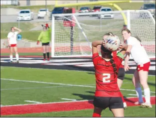  ?? Daniel Bereznicki/McDonald County Press ?? After rolling out of bounds, Yarecci Quintero (No. 2) scans the field and attempts to toss the ball to one of her teammates.