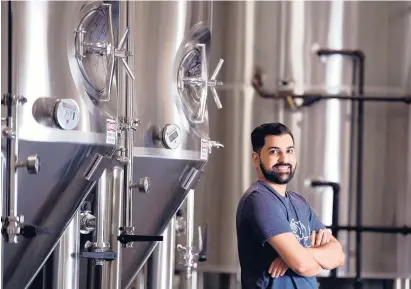  ?? BRAD HORRIGAN/HARTFORD COURANTPHO­TOS ?? Ravi Patel, owner of Other Desi Beer Company, brews his selections at Thimble Island Brewery.