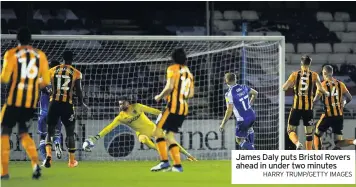  ?? HARRY TRUMP/GETTY IMAGES ?? James Daly puts Bristol Rovers ahead in under two minutes