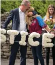  ??  ?? Adrian Deacy hugs daughter Charlotte at a memorial for Joe. Photo : Keith Heneghan