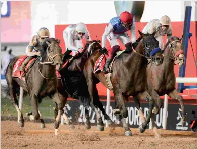  ?? DUBAI RACING CLUB ?? Dettori’s bid for a fifth Dubai World Cup win will be with Country Grammer, whom he rode to victory in the 2022 edition (above). His first win was with Dubai Millennium in 2000.
