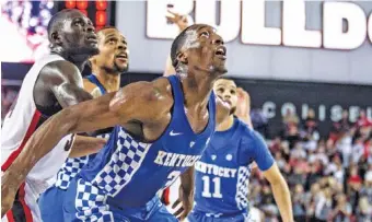  ?? JOHN PAUL VAN WERT/UGA PHOTO ?? Freshman forward Bam Adebayo helped the Kentucky Wildcats earn the top seed for this week’s SEC men’s basketball tournament in Nashville, and they are a No. 2 seed in ESPN’s latest NCAA tournament projection.