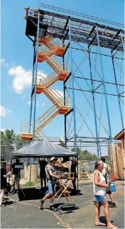  ??  ?? A film crew works on the set of “Whaling” at Frontier City in Oklahoma City.