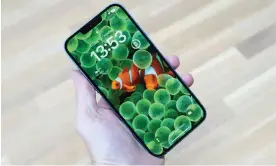  ?? ?? The iPhone 14 Plus is a big phone with a large screen for browsing, watching video or playing games. Photograph: Samuel Gibbs/The Guardian