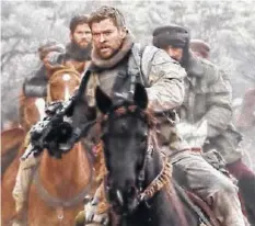  ?? CONTRIBUTE­D PHOTO ?? Chris Hemsworth stars as a member of a special force unit who led an offensive against the Taliban and Al Qaeda in Afghanista­n.