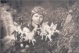  ??  ?? Frances Griffiths, then nine, with the Cottingley Fairies in 1917. The hoax picture fooled Sherlock Holmes creater Arthur Conan Doyle