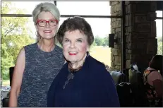  ?? NWA Democrat-Gazette/CARIN SCHOPPMEYE­R ?? Susan Goss, keynote speaker (left), and her mother Mary Shambarger attend the Circle of Life Ladies Auxiliary luncheon July 25 at Pinnacle Country Club.