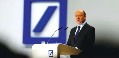  ??  ?? John Cryan, the CEO of Deutsche Bank warned of the fallout from cheap money, cautioning against using the strong euro as a justificat­ion for printing more. (Reuters)