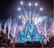  ?? THE WALT DISNEY COMPANY ?? Projection­s and fireworks illuminate Cinderella Castle during Mickey's Not-so-scary Halloween Party.