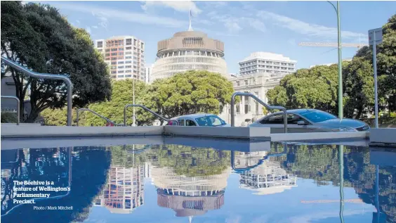  ?? Photo / Mark Mitchell ?? The Beehive is a feature of Wellington’s Parliament­ary Precinct.