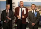  ?? Photograph: Matt Dunham/AP ?? Conservati­ve MP Craig Mackinlay, right, winning the seat of South Thanet in 2015, beating his former Ukip colleague Nigel Farage (left) and comedian Al Murray (centre).