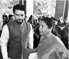  ??  ?? Union Finance Minister Nirmala Sitharaman and Anurag Thakur ahead of the Budget on Saturday
Contrastin­g fate of two key demands shows which way the wind blew this Budget. One demand to remove long-term capital gains tax, introduced by former finance minister Arun Jaitley in 2018, was mostly by domestic asset holders. The tax remains. Another demand, mostly by foreign constituen­cies, was to remove DDT. It has gone.