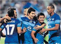  ??  ?? Chonburi players celebrate after scoring against Kitchee.
