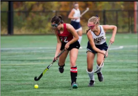  ?? SUBMITTED PHOTO ?? Julia Flood, left, has been the go-to player for Sacred Heart’s field hockey team. The senior has scored five goals in the postseason.