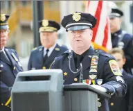  ?? Carol Kaliff / Hearst Connecticu­t Media ?? Sgt. John Krupinsky gives the national memorial service reading at the Danbury Police Department memorial service on May 23, 2012.