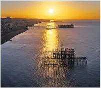  ??  ?? NEW DAWN Stunning sunrise over Brighton & Hove beach