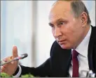  ?? ALEXEI DRUZHININ / SPUTNIK, ?? Russian President Vladimir Putin speaks to internatio­nal news agencies in St. Petersburg on Thursday.