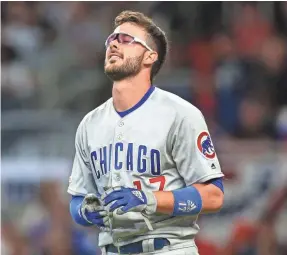  ?? BRETT DAVIS/USA TODAY SPORTS ?? Cubs third baseman Kris Bryant reacts after striking out during a 3-7 start.