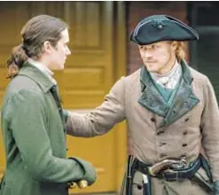  ?? STARZ ?? César Domboy, left, as Fergus and Sam Heughan as Jamie Fraser in “Outlander,” which has begun production for its sixth season after a delay due to the pandemic.