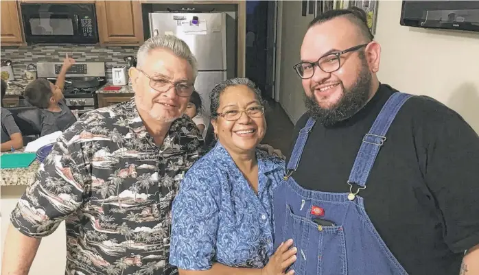  ?? DANIEL PEREA VIA KHN ?? Desiderio and Dominga Perea lost their son David Perea ( right), a traveling nurse with “a tremendous work ethic” who routinely put in 80 hours a week, to COVID- 19 in April. He was 35.