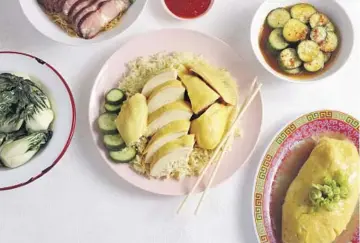  ?? Dania Maxwell Los Angeles Times ?? THE HAINAN CHICKEN RICE, center, is currently a weekend special at Pearl River Deli, which switches up dishes’ availabili­ty.