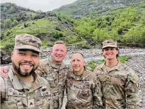  ?? Hubert Delaney III/Contribute­d photo ?? State Rep. Hubert Delany III, D-Stamford, an Army sergeant, left, in the Balkan region during “Operation Immediate Response.”