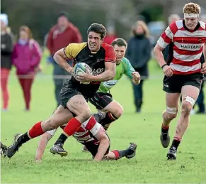  ?? PHOTO: GEORGE HEARD / FAIRFAX NZ ?? University’s Josh Fawcett makes a break during their thrilling 22-20 win over Hautapu that secured a place in the semi-finals.