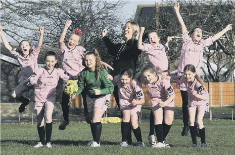  ??  ?? Filey School’s football stars, from left, Amelia Correia, Katie Unsworth, Sienna Hall, Olivia Coe, Claire Fenby (PE co-ordinator) Milly Keary, Millie Jarvis, Asha Poole, Jorji Crawford and Lily Hunter Picture by Richard Ponter (170408)