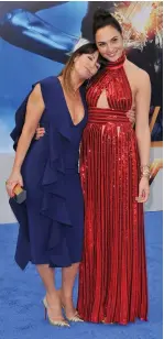  ?? ( Sthanlee B. Mirador/ Sipa USA/ TNS) ?? PATTY JENKINS, left, and Gal Gadot arrive at the ‘ Wonder Woman’ Los Angeles premiere in 2017.