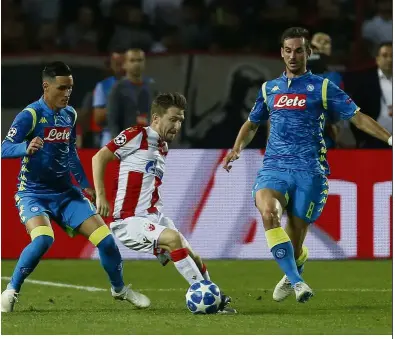 ??  ?? Close tussle: Red Star’s Marko Marin (centre) is challenged by Napoli forward Jose Callejon (left) and Fabian Ruiz during the Champions League Group C match on Tuesday. — AP