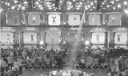  ?? NBC ?? Contestant­s are placed in dance pods on the reality show “Dancing With Myself.”