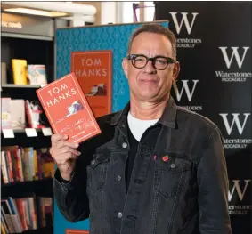  ?? GRANT POLLARD/INVISION/AP ?? Actor Tom Hanks at a signing of his new book, “Uncommon Type.”