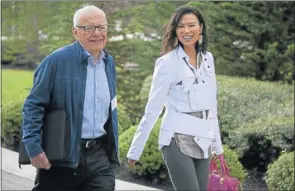  ?? Picture: BLOOMBERG ?? WE’RE GOING: Rupert Murdoch and his wife Wendi Deng in Sun Valley, Idaho, earlier this year.