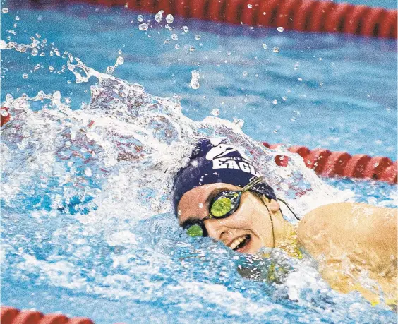  ?? RICK KINTZEL/THE MORNING CALL ?? Maria Lopez of Blue Mountain finishes her swim Sunday during the girls 400-yard freestyle during the District 11 Swimming Championsh­ips at Parkland High School. The relay team finished in first place in the event with a time of 3:42.49.