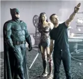  ??  ?? Top to bottom: The League return to the Batcave in a scene that was ultimately reshot for the final edit of Justice League; Ben Affleck and Gal Gadot with original director Zack Snyder.