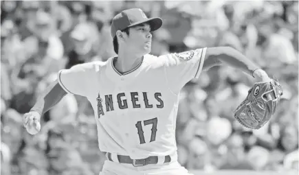  ?? KIRBY LEE/USA TODAY SPORTS ?? Japanese rookie Shohei Ohtani has a 1.38 ERA with 18 strikeouts in 13 innings in his first two starts with the Los Angeles Angels. As a designated hitter, he’s batting .389 with three home runs.