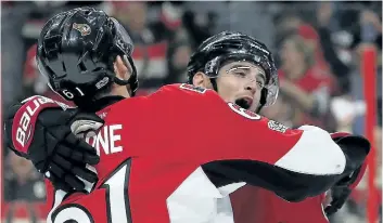  ?? TONY CALDWELL/POSTMEDIA ?? Ottawa’s Chris Wideman, right, celebrates a goal with teammate Mark Stone during Game 2 in Boston.