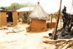  ??  ?? Houses burnt down during the crisis in Miango district