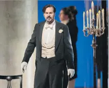  ?? KEN HOWARD/METROPOLIT­AN OPERA ?? Peter Mattei portrays the title character in Eugene Onegin. The Met’s production of the classic opera will be broadcast live in HD to movie theatres worldwide on Saturday.