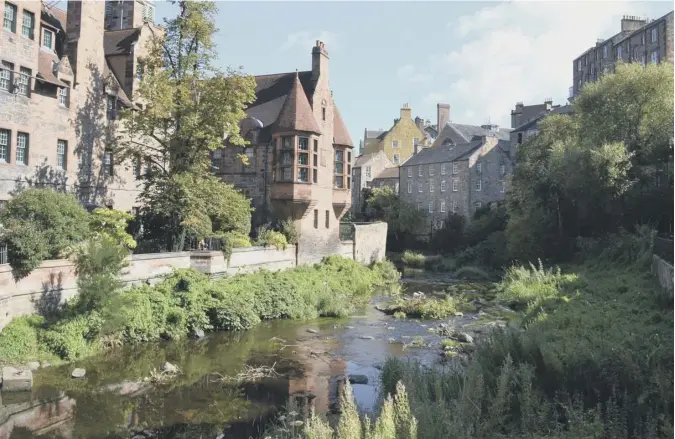  ??  ?? 0 Scotsman reader Bill Blair was in the right place at the right time to capture a tranquil Water of Leith from the metal footbridge at Dean Village in Edinburgh