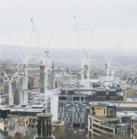  ??  ?? The sight of cranes, like these over the St James Centre site in Edinburgh last year, have long delighted local politician­s