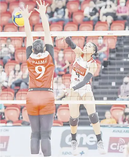  ?? PHOTOGRAPH COURTESY OF PVL ?? TAI Bierria of Cignal eludes the defense of Petro Gazz middle blocker Remy Palma during their PVL Reinforced Conference semifinals match yesterday. The HD Spikers took the first finals seat despite losing in four sets.