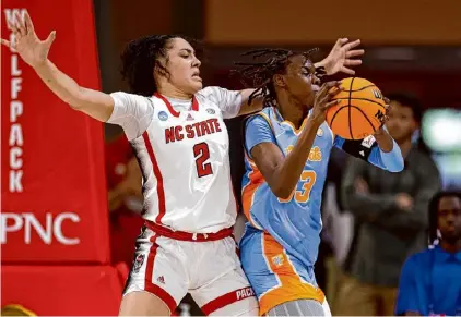  ?? Lance King/getty Images ?? Tennessee’s Jillian Hollingshe­ad moves the ball against North Carolina State’s Mimi Collins during the first half in a second-round NCAA Tournament game on Monday in Raleigh, N.C.