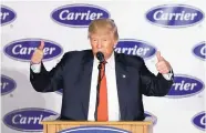  ?? DARRON CUMMINGS/ASSOCIATED PRESS ?? President-elect Donald Trump reacts after speaking at Carrier Corp. Thursday in Indianapol­is, Ind. His freewheeli­ng style is a shift from tradition for presidents-elect.