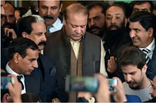  ??  ?? Former premier Nawaz Sharif leaves the Supreme Court building in Islamabad on Tuesday. —