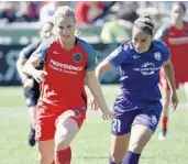  ?? DON RYAN/ASSOCIATED PRESS ?? Orlando Pride defender Monica Hickmann Alves, right, says the team is slowly getting used to its roster turnover.